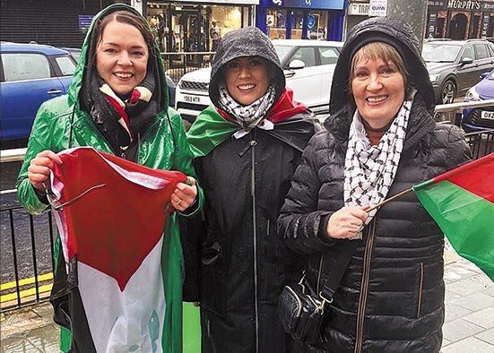 Protestors defy downpour to show support for Palestine