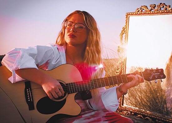 Downpatrick musician  Deborah performing at  gig in memory of dad