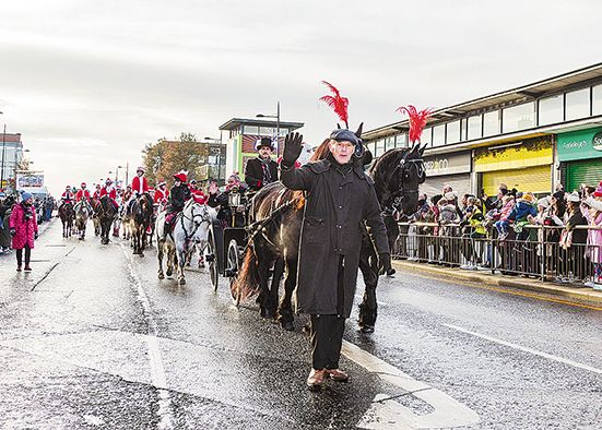 Ho-ho-ho... Santa rides into town